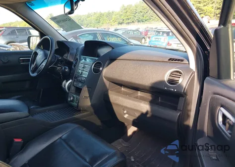 2009 Honda Pilot Touring z USA, uszkodzony, nr VIN 5FNYF48979B045771